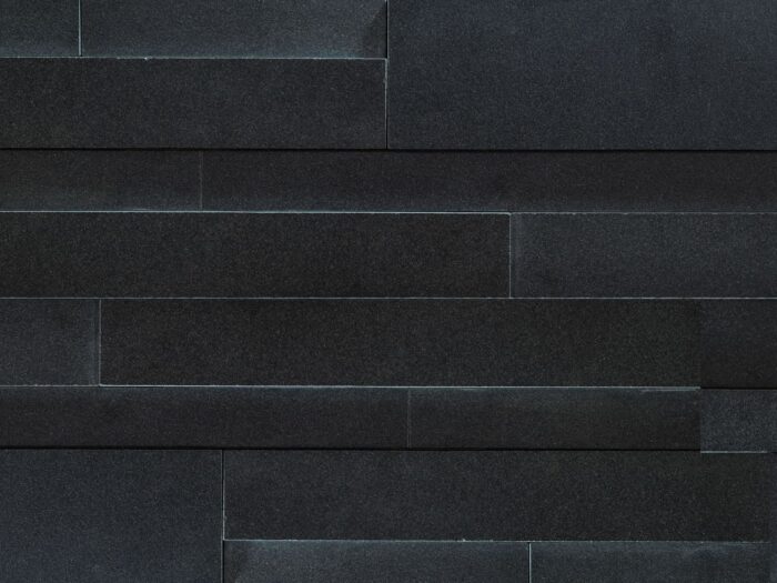 Closeup of Aksent 3D Ebony Basalt natural stone panel product