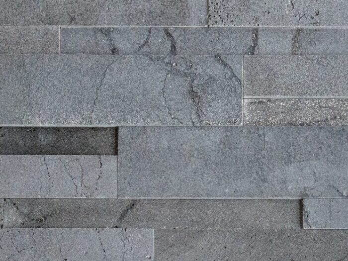 Closeup of Aksent 3D Graphite lavastone natural stone panel product