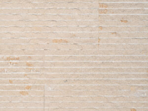 Closeup of AllClad Dune Split Chipped natural stone tile product