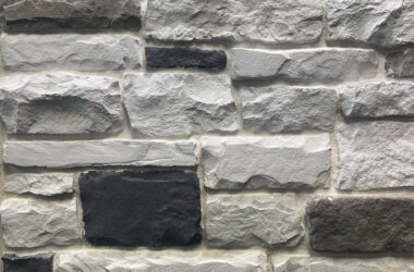 Close-up of harbor chiseled edge manufactured stone veneer H-series Commercial offering by Hedberg Home