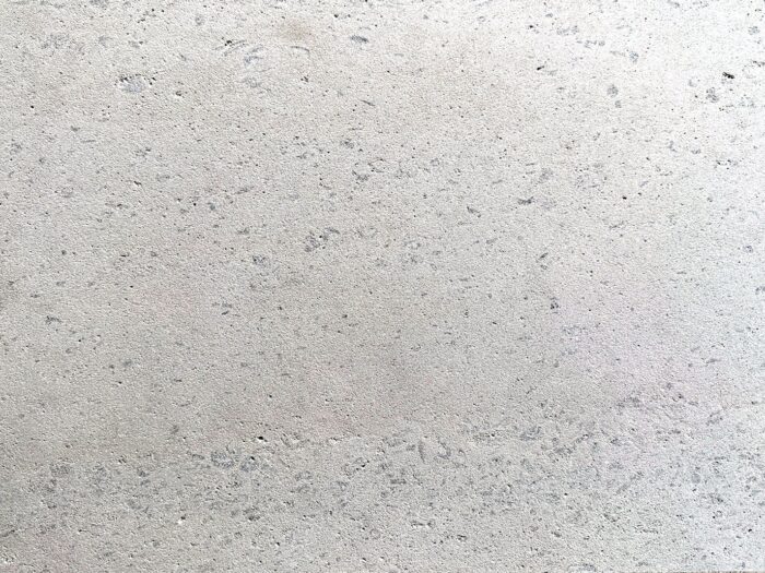 Closeup of AllClad Luna Sandblasted natural stone tile product