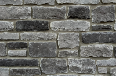 Closeup of Midnight Run Chiseled Edge Manufactured Stone Veneer H-series Commercial offering by Hedberg Home