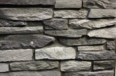 Close-up of midnight run granite ledge manufactured stone veneer