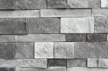 Close-up of midnight run precision edge manufactured stone veneer H-series Commercial offering by Hedberg Home