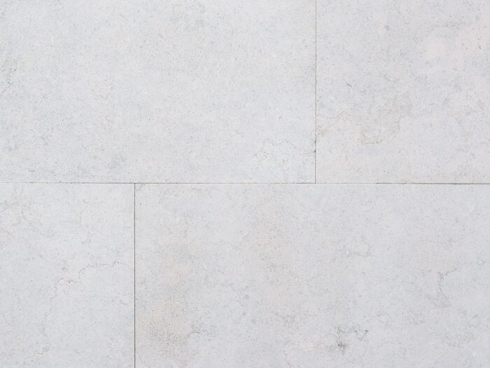 Closeup of AllClad Sierra Cashmere natural stone tile product