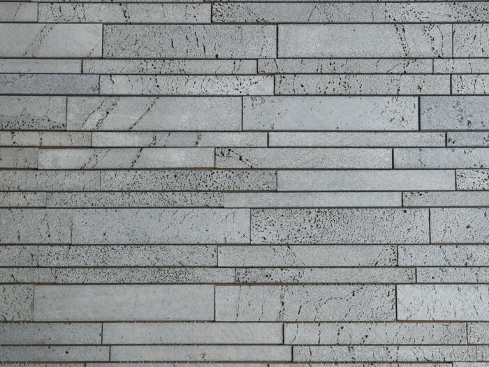 Closeup of platinum lavastone lynia natural stone sheeted format product